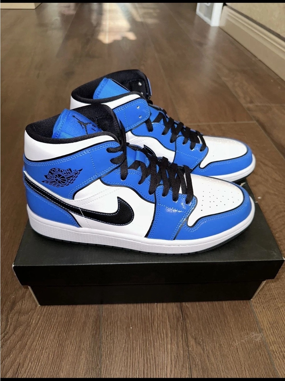 Nike Air Jordan 1 Mid White Blue Black Sneakers